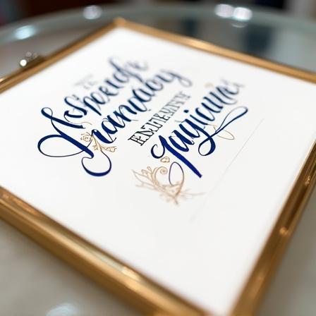 Bespoke calligraphy art commission for luxury cruise ship auction